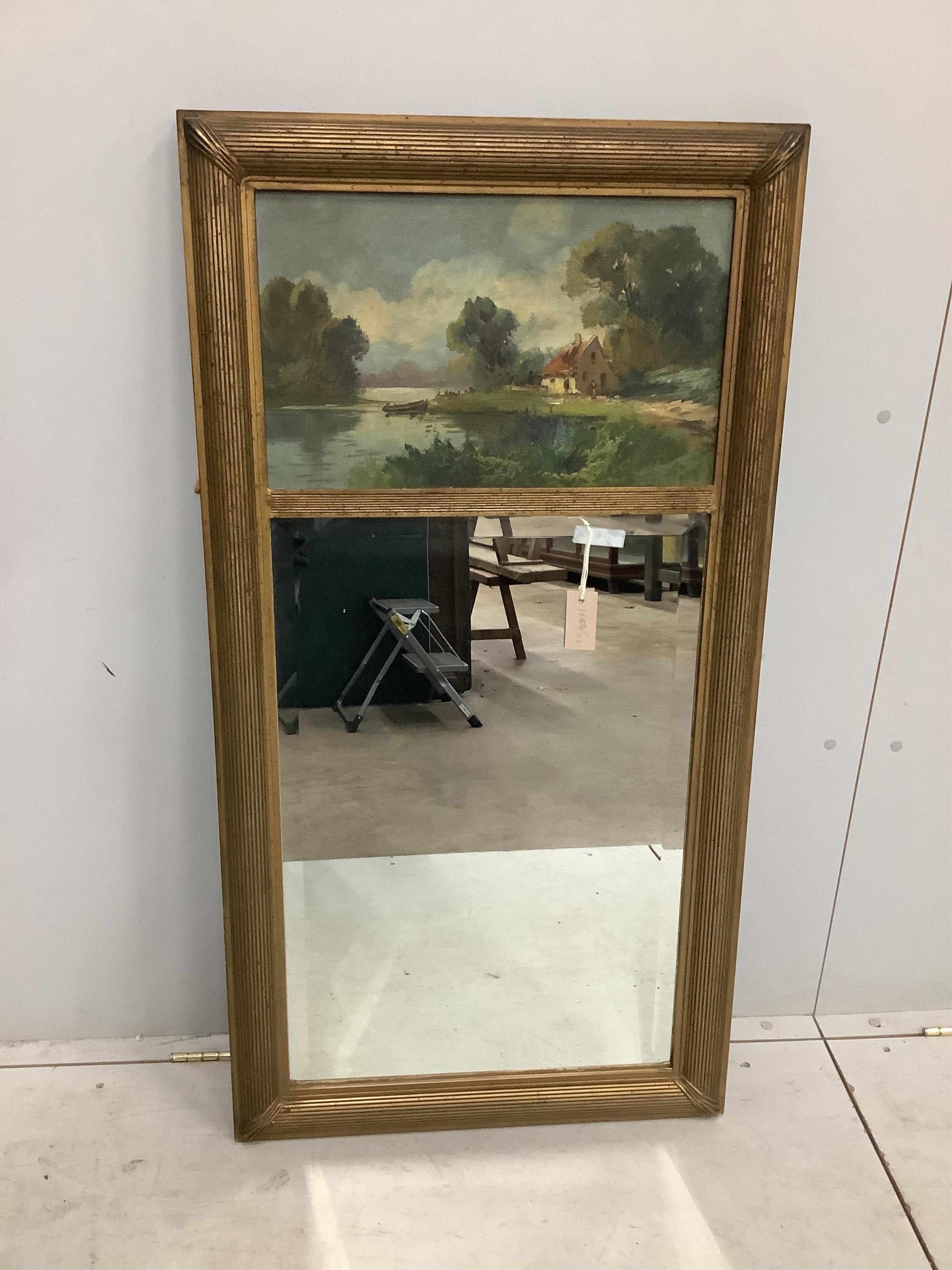 A Victorian style gilt framed trumeau wall mirror, with painted lake landscape, width 64cm, height 122cm. Condition - fair